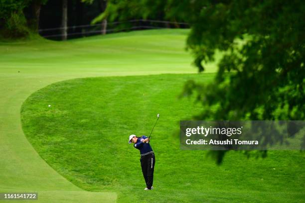 Mone Inami of Japan hits her second shot on the 18th hole during the second round of the Nippon Ham Ladies Classic at Katsura Golf Club on July 12,...