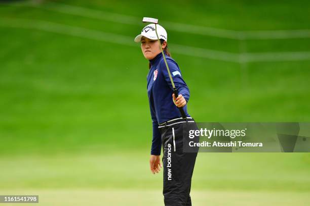 Mone Inami of Japan reacts after missing the birdie putt on the 18th green during the second round of the Nippon Ham Ladies Classic at Katsura Golf...