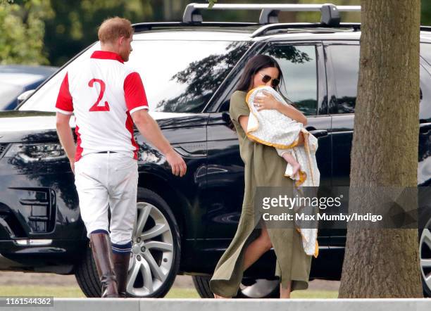 Prince Harry, Meghan, Duchess of Sussex and Archie Harrison Mountbatten-Windsor attend the King Power Royal Charity Polo Match, in which Prince...