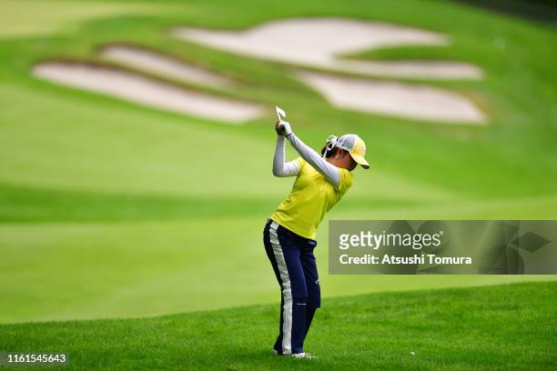 Yui Kawamoto of Japan hits her second shot on the 18th hole during the second round of the Nippon Ham Ladies Classic at Katsura Golf Club on July 12,...