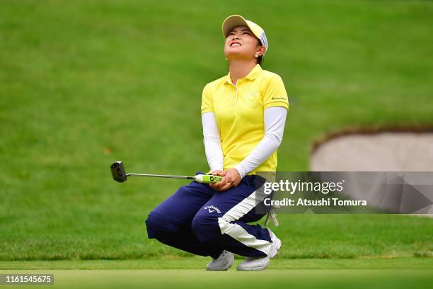 Yui Kawamoto of Japan reacts after missing the birdie putt on the 18th green during the second round of the Nippon Ham Ladies Classic at Katsura Golf...