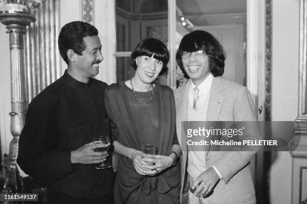 Issey Miyake, Chantal Thomass et Kenzo lors d'un déjeuner au ministère de la culture à Paris le 21 mars 1984, France.