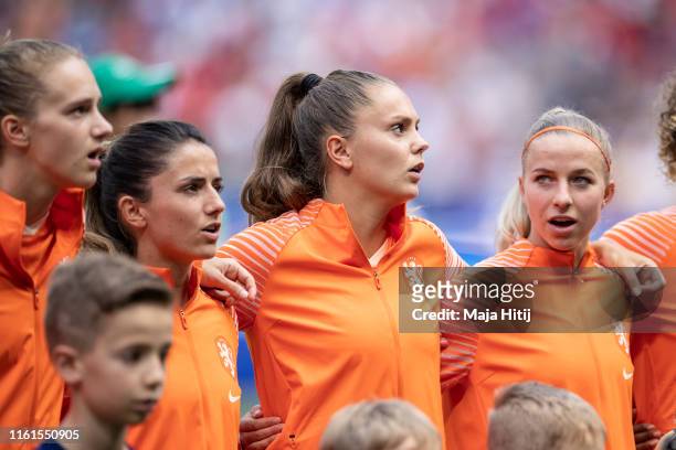 Vivianne Miedema , Danielle van de Donk, Lieke Martens and Jackie Groenen sing during a national anthem prior to the 2019 FIFA Women's World Cup...