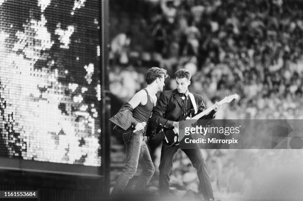 Wham, The Farewell Concert at Wembley Stadium, London England George Michael and Andrew Ridgeley on stage. 28th June 1986.