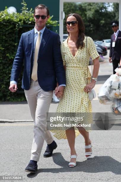 Pippa Middleton and James Matthews attend day 11, the Mens semi-finals at the Wimbledon 2019 Tennis Championships at All England Lawn Tennis and...