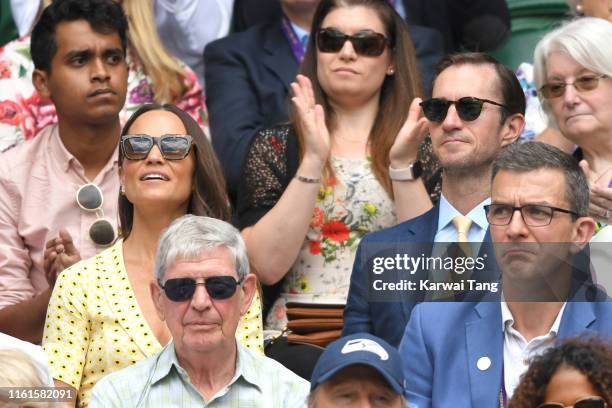 Pippa Middleton and James Matthews on Centre Court during day eleven of the Wimbledon Tennis Championships at All England Lawn Tennis and Croquet...