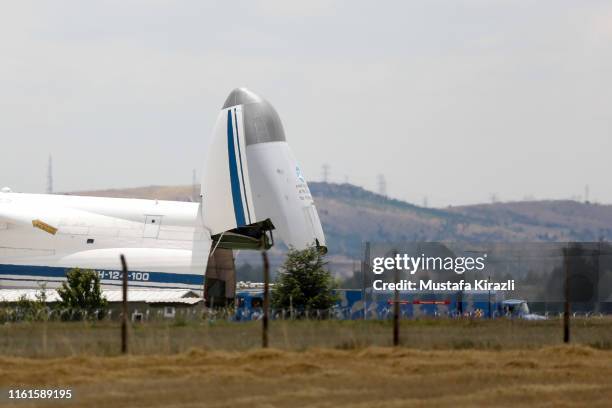 Cargo is unloaded from a Russian AN-124 cargo plane transporting parts of the S-400 air defence system from Russia, after it landed at Murted...