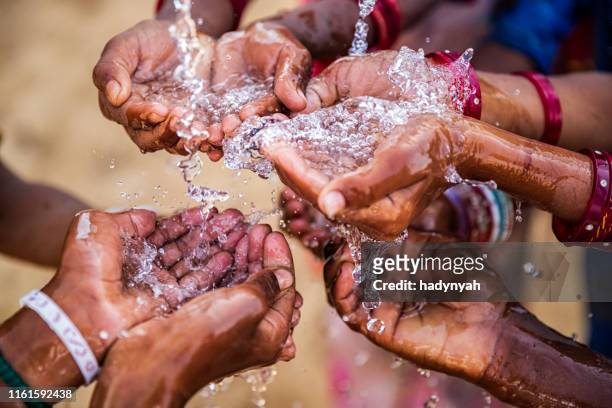 poor indian children asking for fresh water, india - water stock pictures, royalty-free photos & images