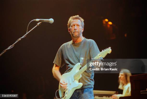 English rock guitarist, singer and musician Eric Clapton performs live on stage at the Royal Albert Hall in London on 19th February 1996.