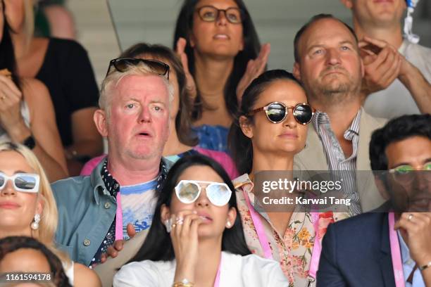 Chris Evans and Natasha Shishmanian on Centre Court during day eleven of the Wimbledon Tennis Championships at All England Lawn Tennis and Croquet...