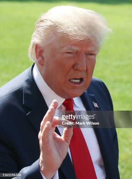 President Donald Trump speaks about the resignation of Labor Secretary Alex Acosta while talking to the media at the White House on July 12, 2019 in...