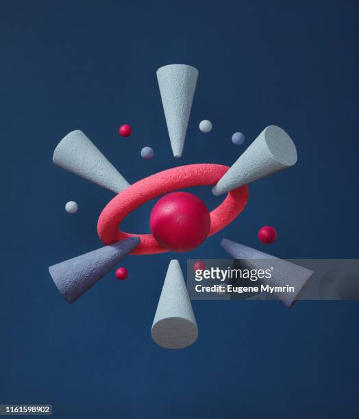 Abstract multi-colored objects on dark blue background