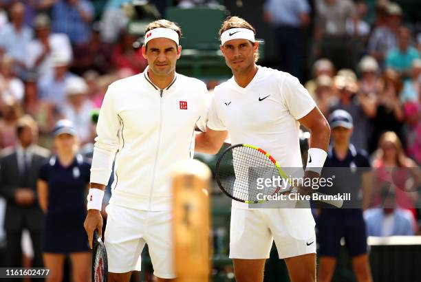 Roger Federer of Switzerland and Rafael Nadal of Spain pose for a picture at the net prior to their Men's Singles semi-final match during Day eleven...