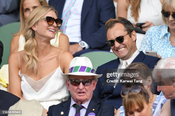 Phillipa Law and Jude Law attend day eleven of the Wimbledon Tennis Championships at All England Lawn Tennis and Croquet Club on July 12, 2019 in...