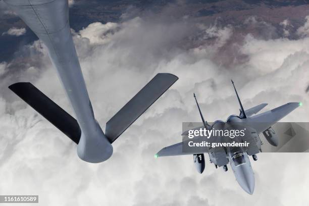 fighter jet refueling - united states air force stock pictures, royalty-free photos & images