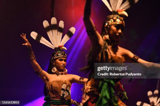 Spirit of the Hornbill of Indonesia perform during the Rainforest World Music Festival at Sarawak Cultural Village on July 12, 2019 in Kuching,...