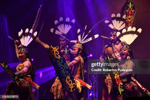 Spirit of the Hornbill of Indonesia perform during the Rainforest World Music Festival at Sarawak Cultural Village on July 12, 2019 in Kuching,...