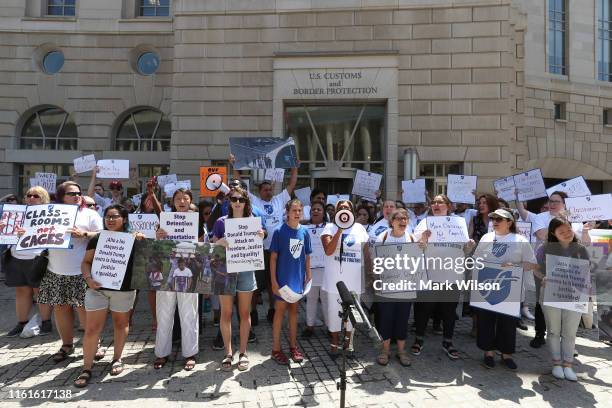 Immigration activists gather in front of the U.S. Customs and Border Protection Headquarters to protest President Trump’s immigration positions,...