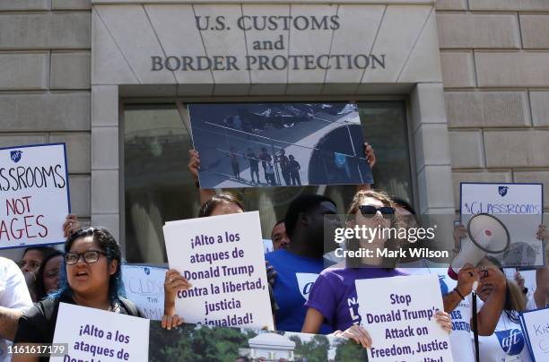 Immigration activists gather in front of the U.S. Customs and Border Protection Headquarters to protest President Trump’s immigration positions,...