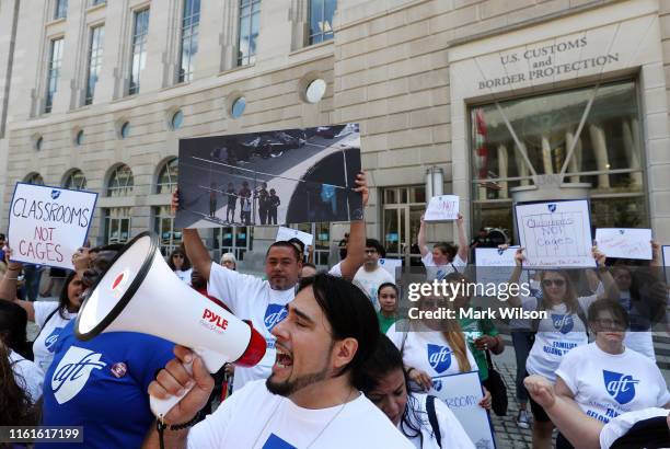 Immigration activists gather in front of the U.S. Customs and Border Protection Headquarters to protest President Trump’s immigration positions,...