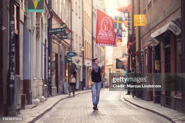 a walk in the streets of gamla stan, stockholm - stockholm stock pictures, royalty-free photos & images