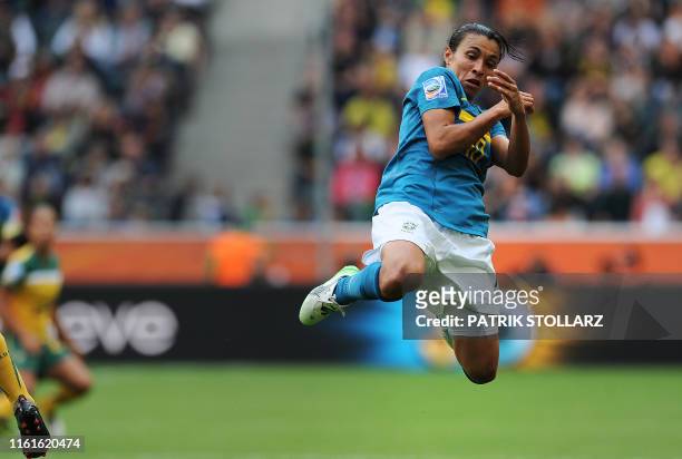 Brazil's striker Marta jumps during the group D football match of the FIFA women's football World Cup Brazil vs Australia on June 29, 2011 at the...