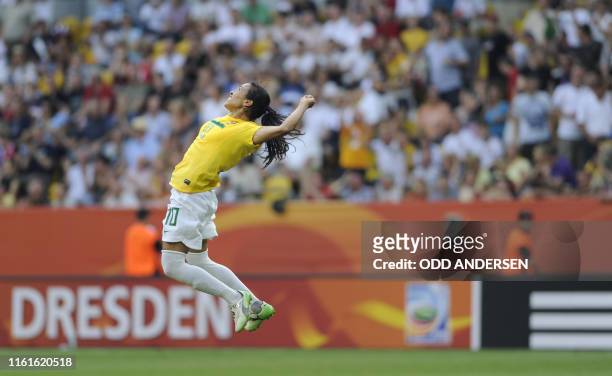 Brazil's striker Marta celebrates after scoring the 2-1 during the quarter-final match of the FIFA women's football World Cup Brazil vs USA on July...