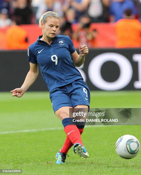 France's striker Eugenie Le Sommer plays the ball during the quarter-final match of the FIFA women's football World Cup England vs France on July 9,...