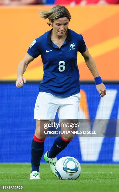 France's defender Sonia Bompastor plays the ball during the Sweden vs France FIFA women's football World Cup match for third place at the...