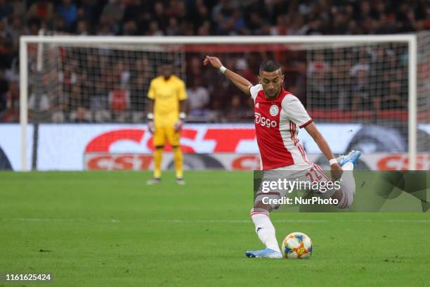 Hakim Ziyech of Ajax and Anderson Esiti of PAOK as seen in action during the FC AJAX Amsterdam vs PAOK Salonika football match game with score 3-2...