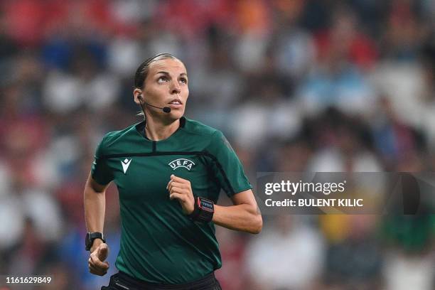 French referee Stephanie Frappart is pictured ahead of the UEFA Super Cup 2019 football match between FC Liverpool and FC Chelsea at Besiktas Park...