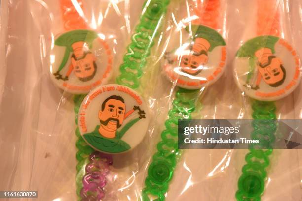 Rakhis with the face of Wing Commander Abhinandan Varthaman on the eve of Raksha Bandhan, at Regar Pura, Karol Baghon August 14, 2019 in New Delhi,...