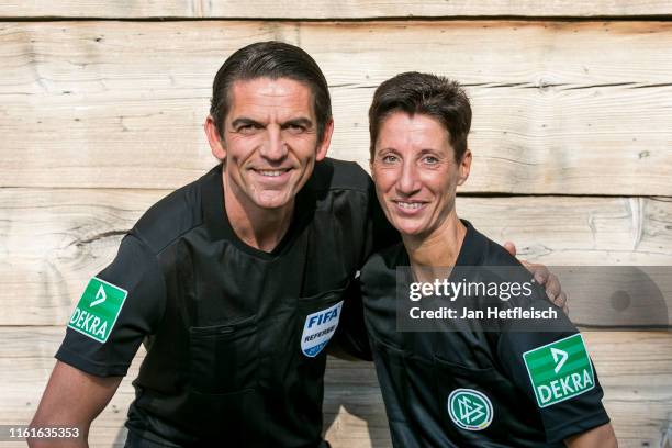 Referees of the year Deniz Aytekin and Marina Wozniak pose for a picture ahead the Referee Of The Year Awarding Ceremony on July 12, 2019 in Grassau,...