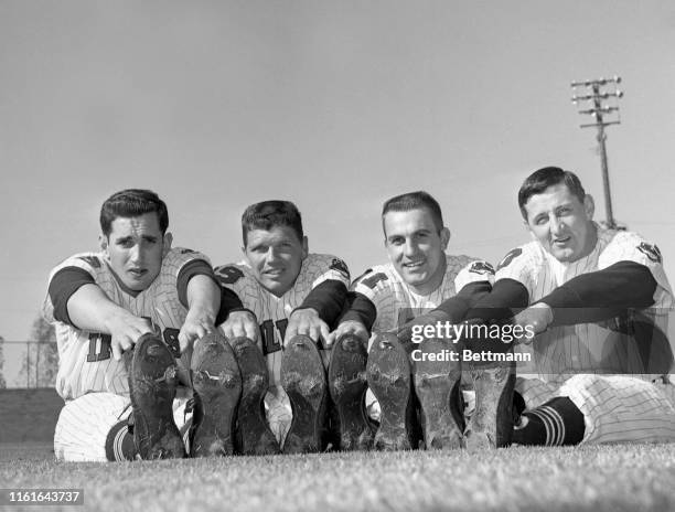 Cleveland Indian pitchers : Barry Latman, Gary Bell, Jim Perry, and Dick Donovan limber up at the Indians spring training camp as they prepare for...