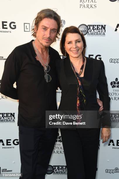Darren Strowger and Sadie Frost attend the Teen Cancer America Suite at Bob Dylan and Neil Young in Hyde Park on July 12, 2019 in London, England.