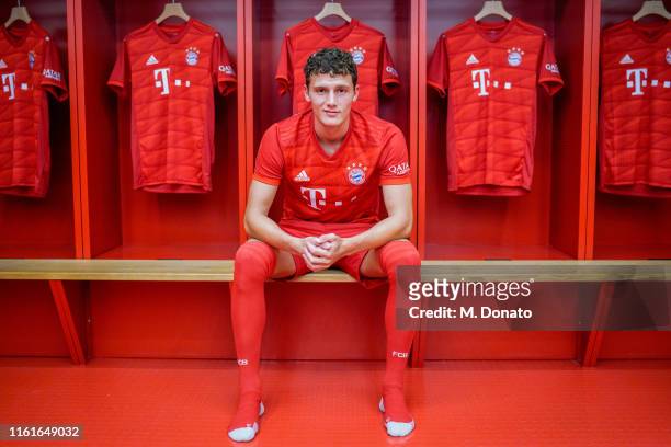 Benjamin Pavard of FC Bayern Muenchen poses in the dressing room after a press conference to announce his signing at Allianz Arena on July 12, 2019...