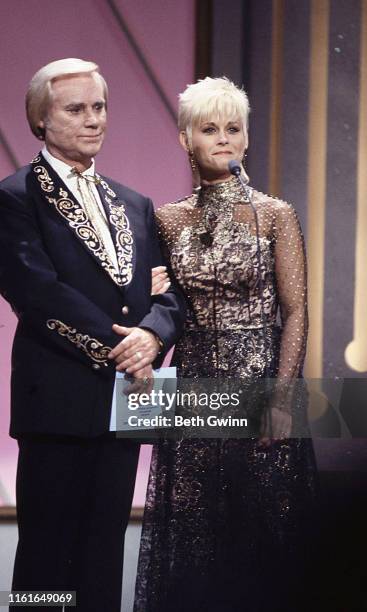 Country Music Singer Songwriter George Jones & Lori Morgan presenter's at CMA Award show on September 28, 1991 in Nashville, Tennessee