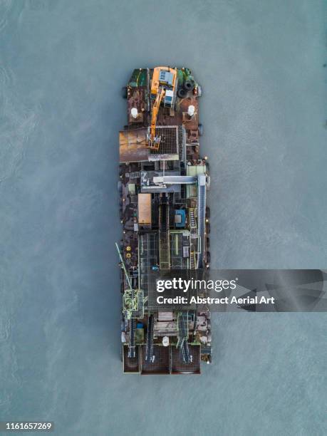 aerial shot of a dredging vessel, austria - draga fotografías e imágenes de stock