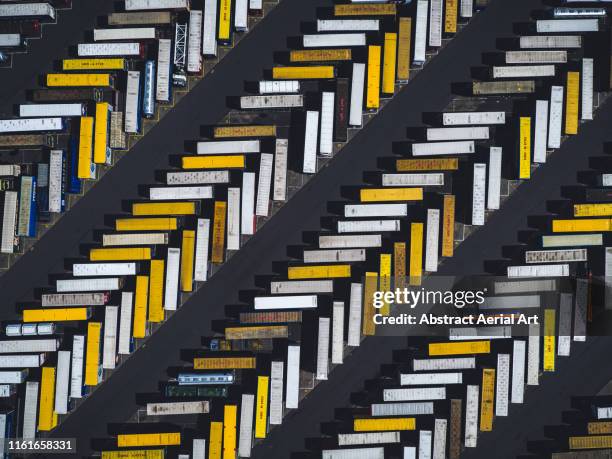 aerial shot of parked trucks, scunthorpe, united kingdom - queue system stock pictures, royalty-free photos & images