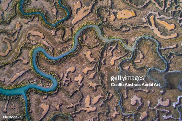 Abstract drone image of marshlands at low tide, England, United Kingdom