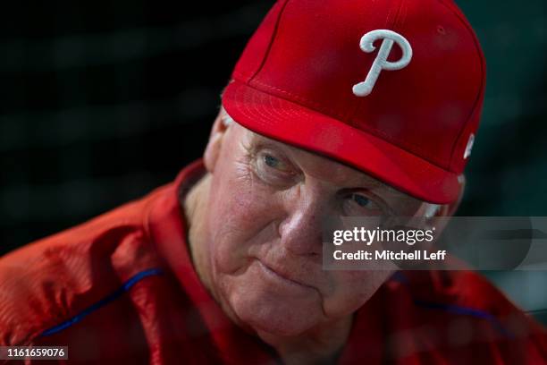 New hitting coach Charlie Manuel of the Philadelphia Phillies looks on from the dugout prior to the start of the top of the seventh inning against...