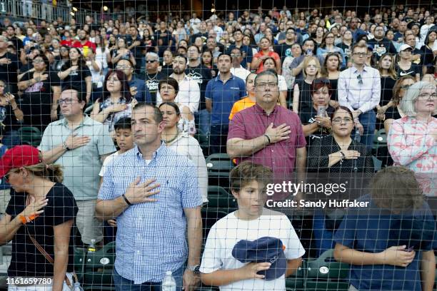 People attend a community memorial service honoring victims of the mass shooting earlier this month which left 22 people dead and 24 more injured, at...