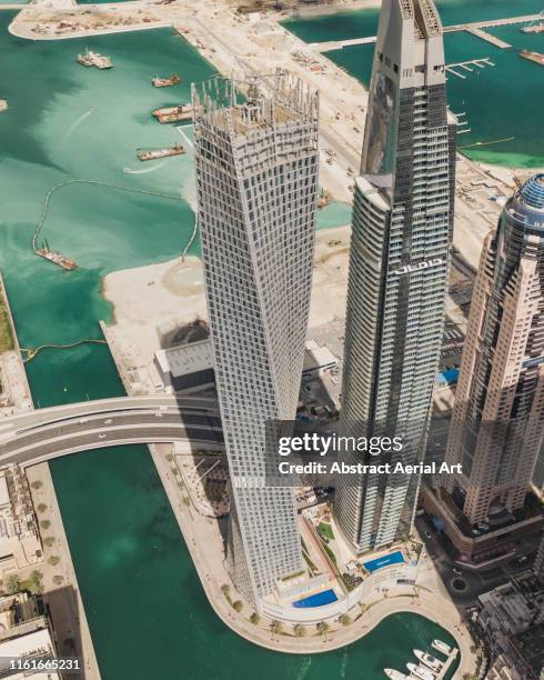 aerial shot of modern designed buildings, dubai, united arab emirates - dubai bridge stock pictures, royalty-free photos & images