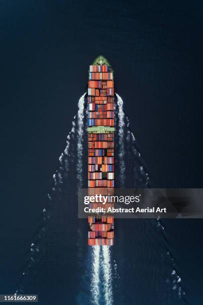 aerial shot over a container ship at sea, hong kong - china ship stockfoto's en -beelden