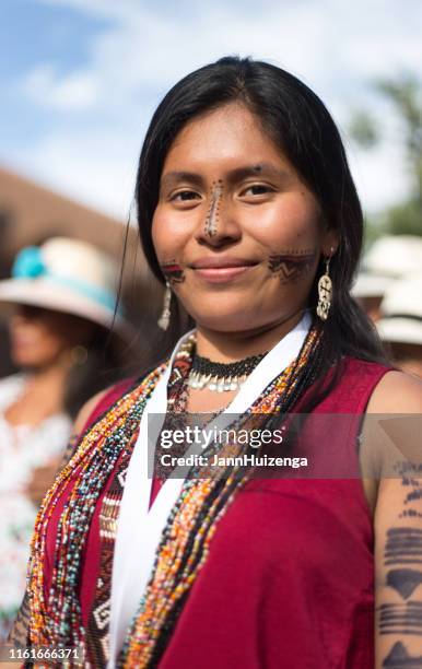 santa fe, nm: colombian artist with tattoos, folk art parade - colombian ethnicity stock pictures, royalty-free photos & images
