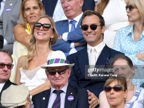 Phillipa Law and Jude Law attend day eleven of the Wimbledon Tennis Championships at All England Lawn Tennis and Croquet Club on July 12, 2019 in...