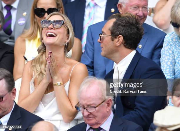 Phillipa Law and Jude Law attend day eleven of the Wimbledon Tennis Championships at All England Lawn Tennis and Croquet Club on July 12, 2019 in...