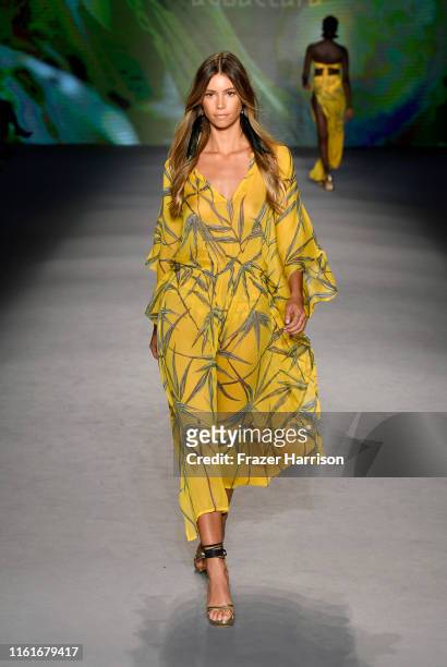 Model walks the runway during Aguaclara Fashion Show - Paraiso Miami Beach at The Paraiso Tent on July 12, 2019 in Miami Beach, Florida.