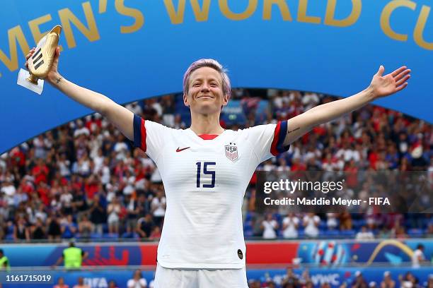 Megan Rapinoe of the USA celebrates with the Golden Boot after the 2019 FIFA Women's World Cup France Final match between The United State of America...