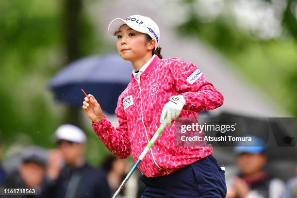 Erika Kikuchi of Japan reacts after her tee shot on the 1st hole during the second round of the Nippon Ham Ladies Classic at Katsura Golf Club on...